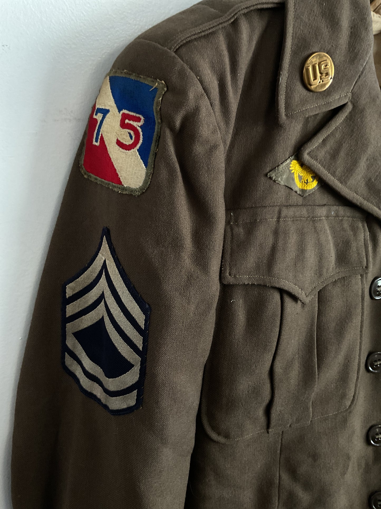 WWII U.S. Army 75th Infantry Division Ike Jacket - Staff Sergeant, ADSEC with Ruptured Duck, Ribbon Bar, and Marksman Badge - Size Medium (Estimated)