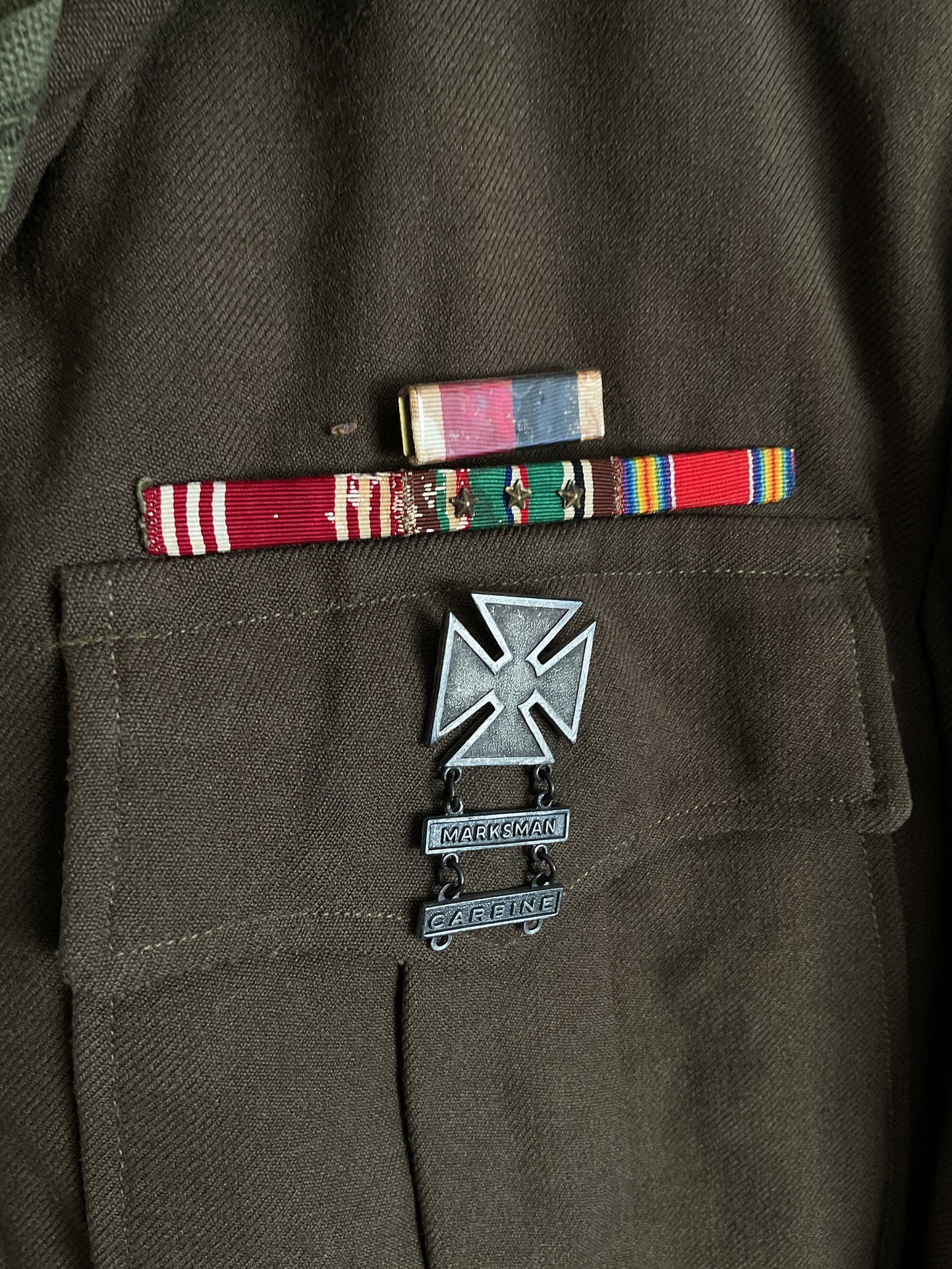 WWII U.S. Army 75th Infantry Division Ike Jacket - Staff Sergeant, ADSEC with Ruptured Duck, Ribbon Bar, and Marksman Badge - Size Medium (Estimated)