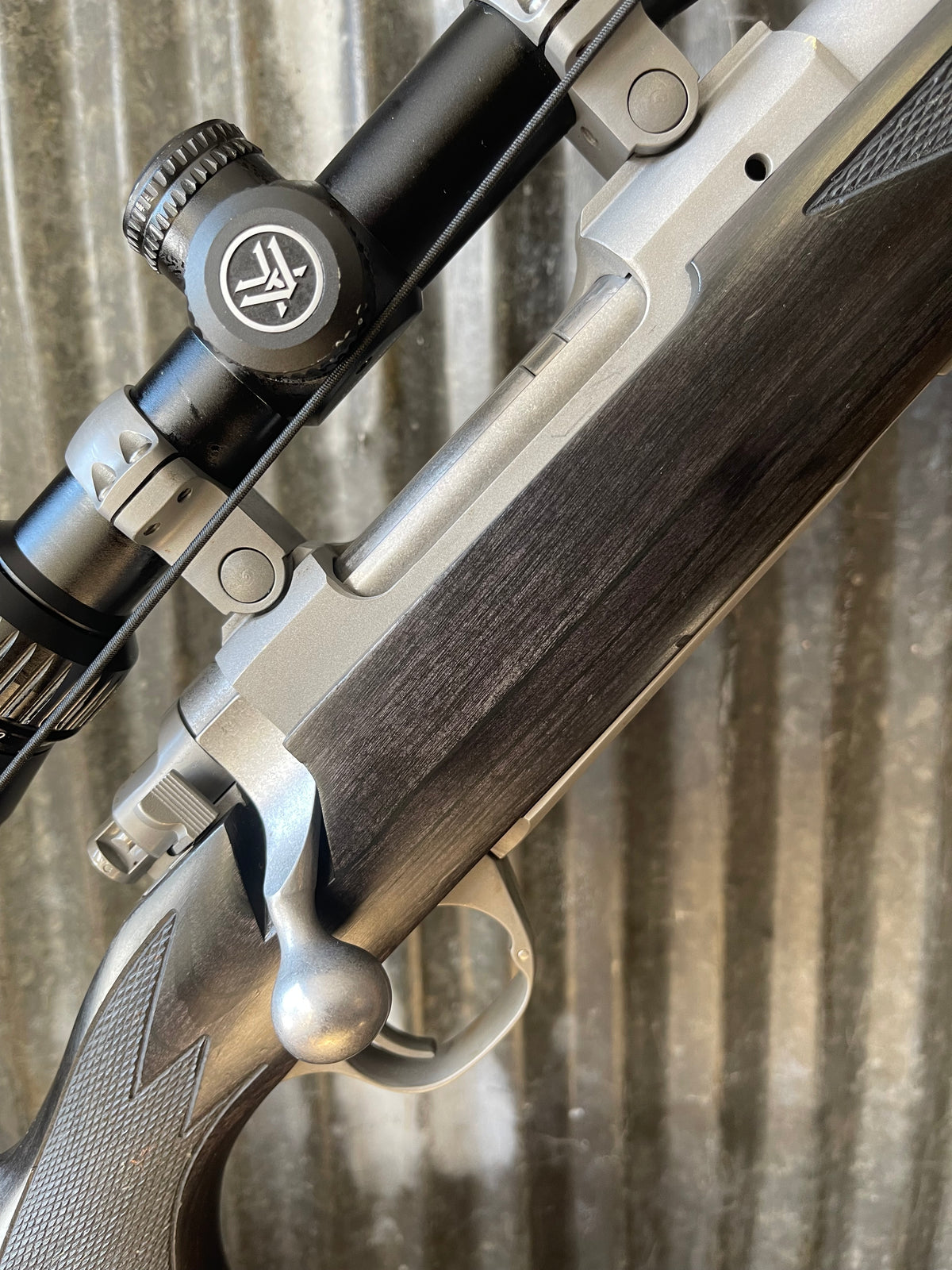 Ruger M77 Compact .243 Win – Stainless / Black Laminate – Vortex Crossfire II 4-12x Scope