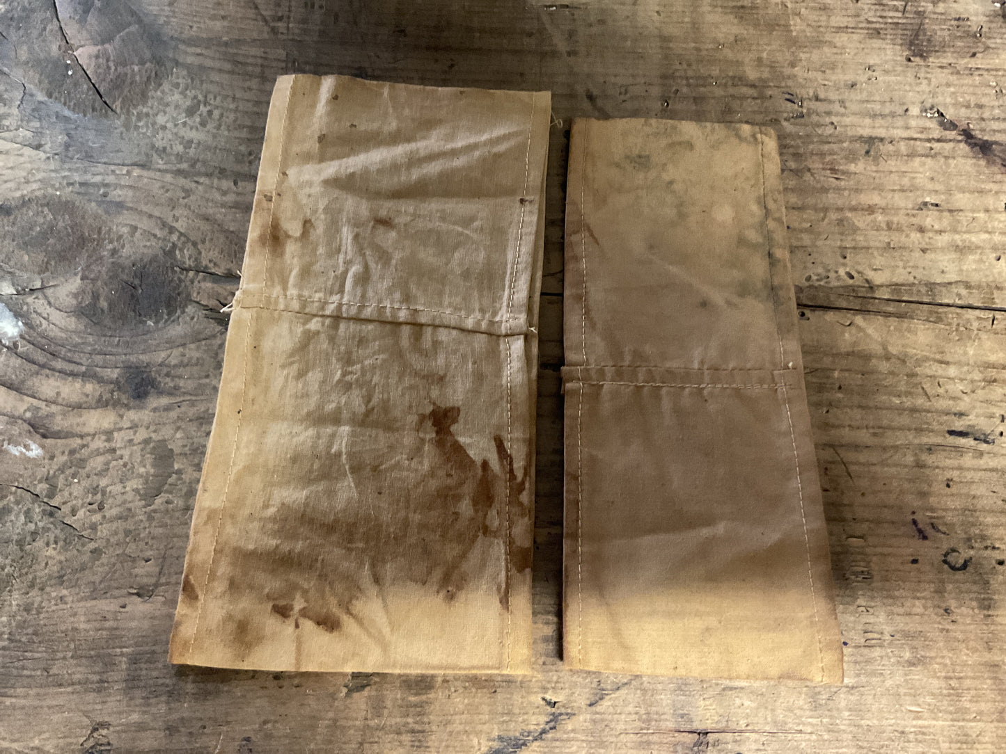 Pair of WWII-era Jewish Ghetto Armbands with Yiddish Lettering