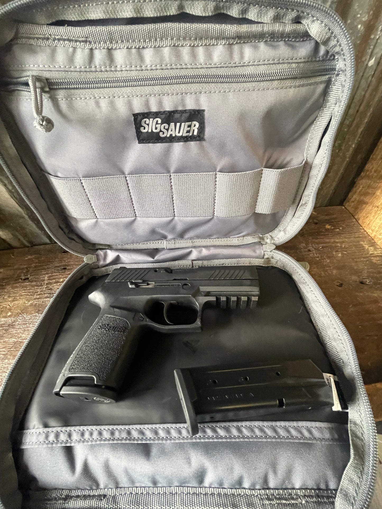 SIG Sauer P320 Compact 9mm Semi-Automatic Pistol – 2 Magazines – 5.11 SIG Sauer Carry Case – Good Condition