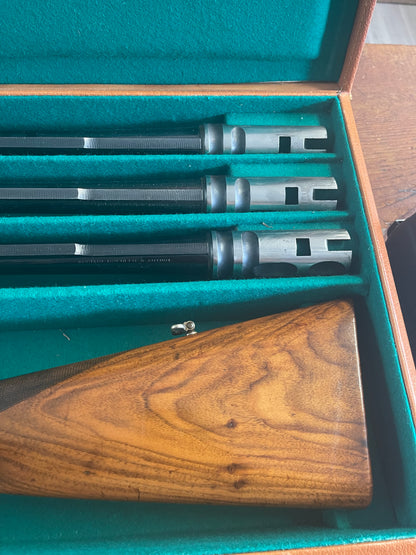 Exceptional 1950s Cosmi Brevettato Special-Order 12 Gauge – Three-Barrel Set – Case-Hardened Receiver – English Straight-Hand Stock – Original Fitted Case – Robert Foman Provenance