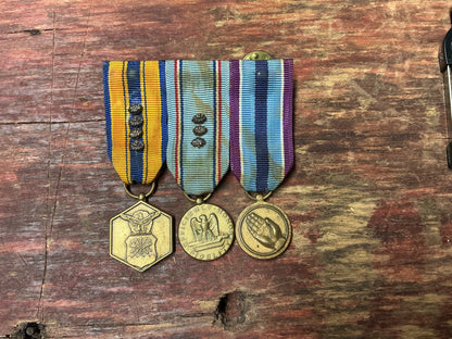 U.S. Military Merit, Good Conduct & Humanitarian Service Medal Grouping – Three Medal Bar