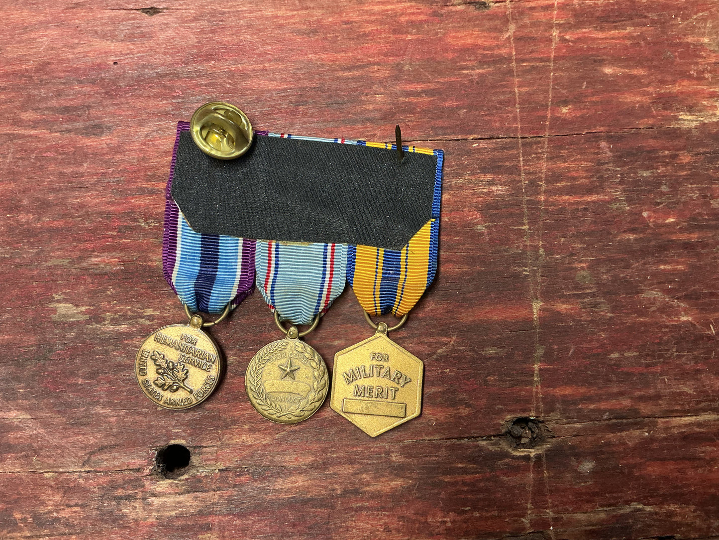 U.S. Military Merit, Good Conduct & Humanitarian Service Medal Grouping – Three Medal Bar