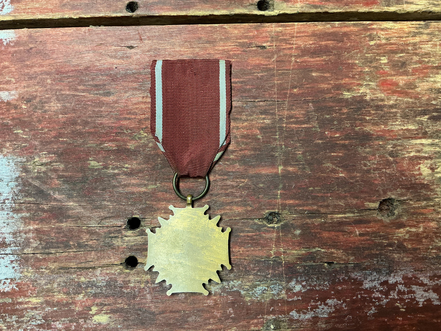 Polish People’s Republic Medal of Merit Style Decoration – PRL Cross with Maroon Ribbon