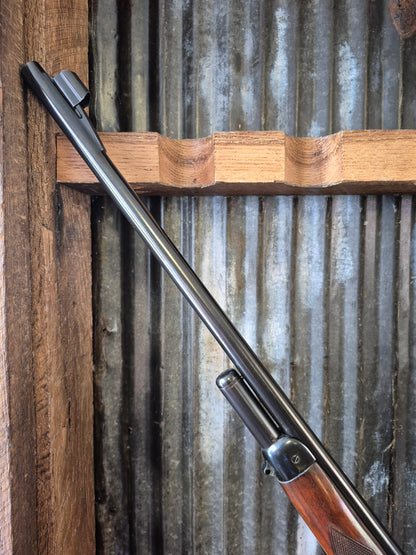 Winchester Model 71 Deluxe with Redfield rear peep sight.