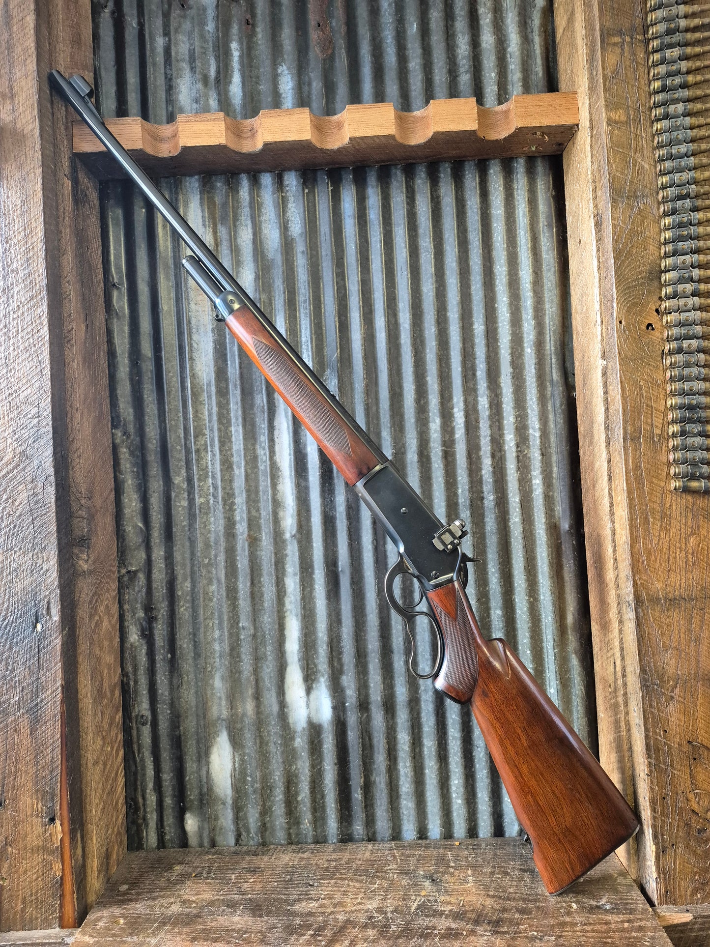 Winchester Model 71 Deluxe with Redfield rear peep sight.
