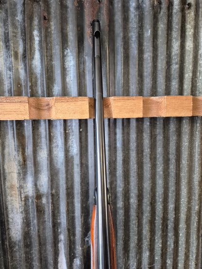 Winchester Model 71 Deluxe with Redfield rear peep sight.