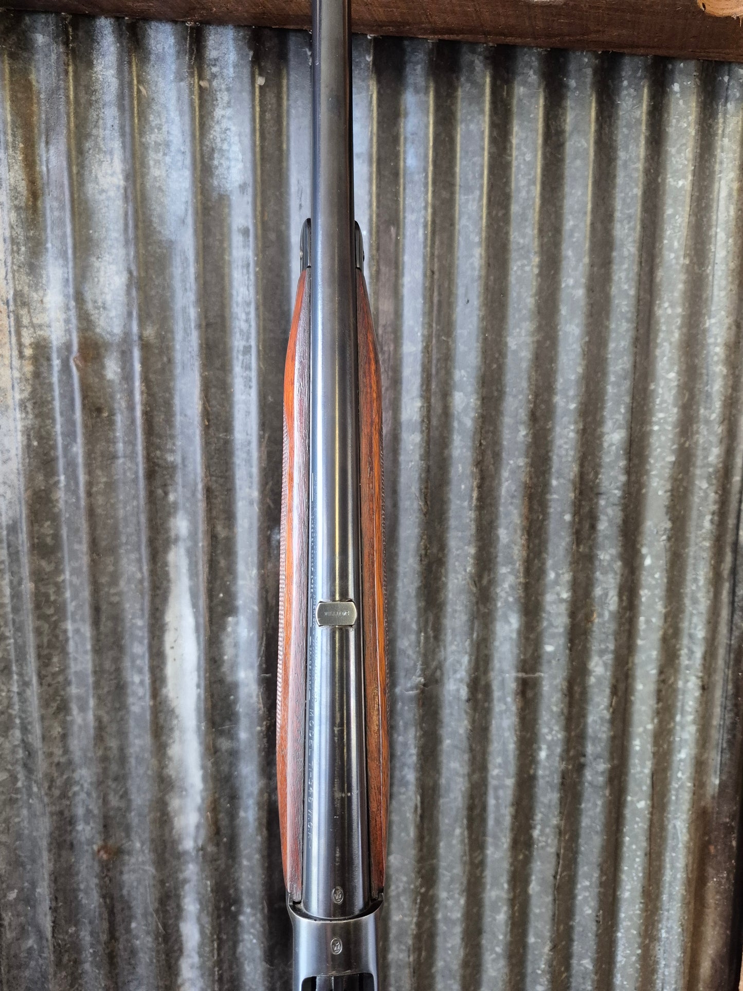 Winchester Model 71 Deluxe with Redfield rear peep sight.