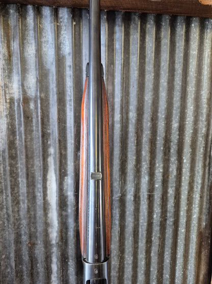 Winchester Model 71 Deluxe with Redfield rear peep sight.