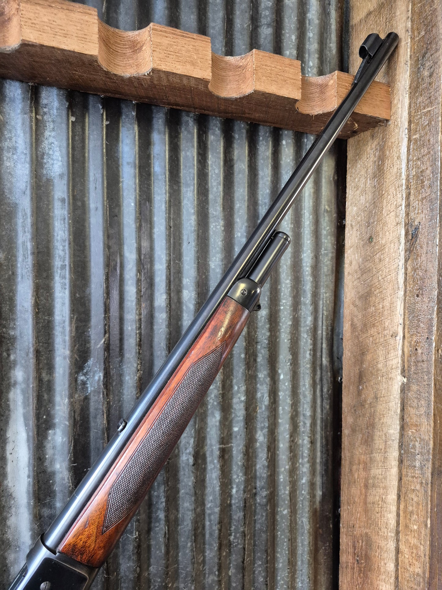 Winchester Model 71 Deluxe with Redfield rear peep sight.